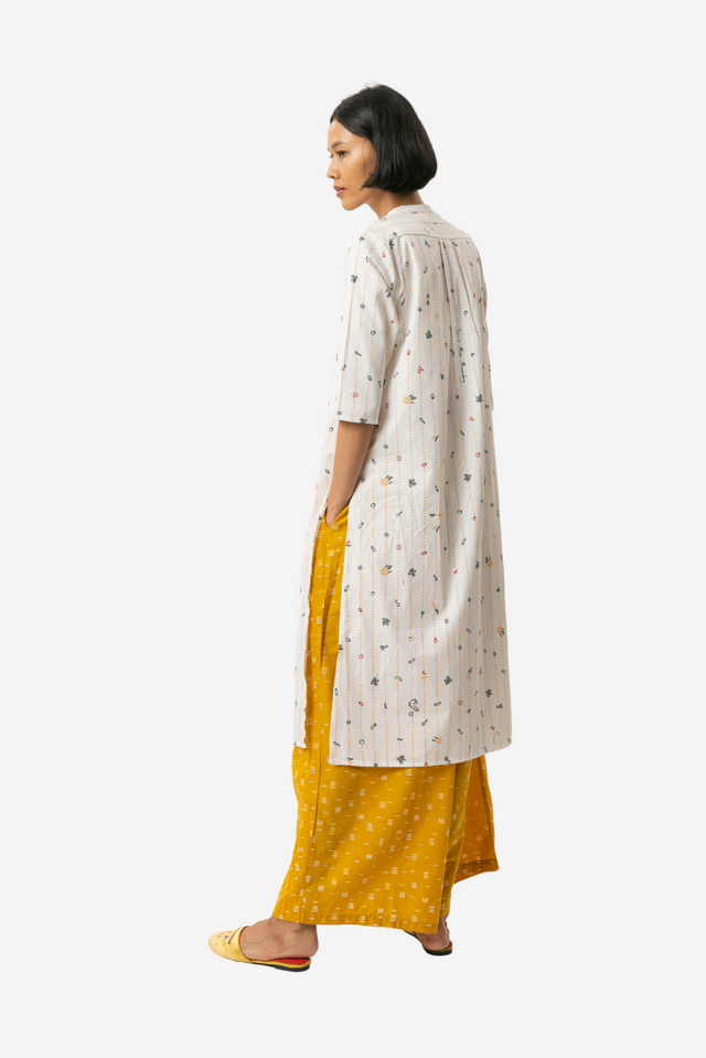 "Sejauh Mata Memandang X Dian Sastrowardoyo" "Tumbuh" - Baju Panjang