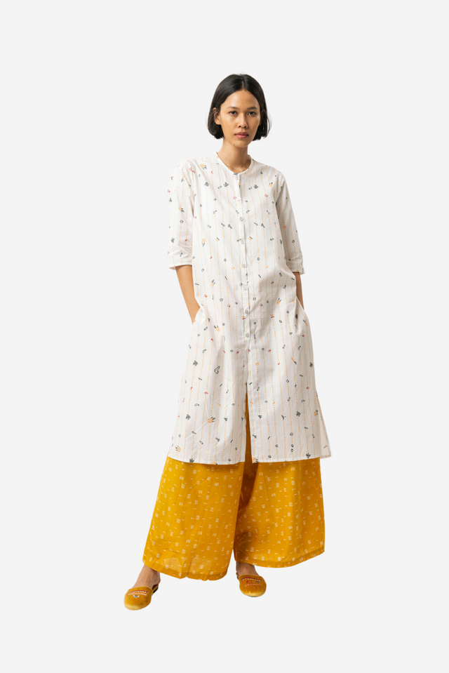 "Sejauh Mata Memandang X Dian Sastrowardoyo" "Tumbuh" - Baju Panjang